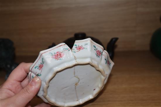 An 18th century Chinese Export famille rose teapot, cover and a similar dish